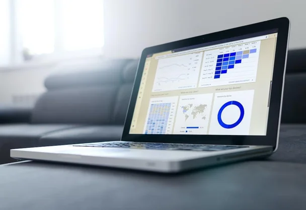 A laptop displaying sales data analytics from a guided selling solution.