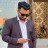 Atinder S Gill