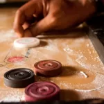 Must Try Your Hands On This Unique Way Of Playing Carrom