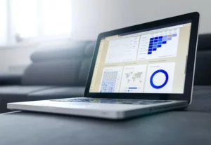 A laptop displaying sales data analytics from a guided selling solution.
